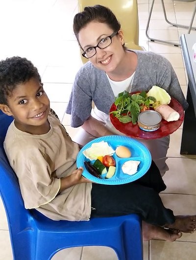 Lydia O'Meara, researcher from CQU, with a nutritional workshop participant in the Sigatoka Valley, Fiji.