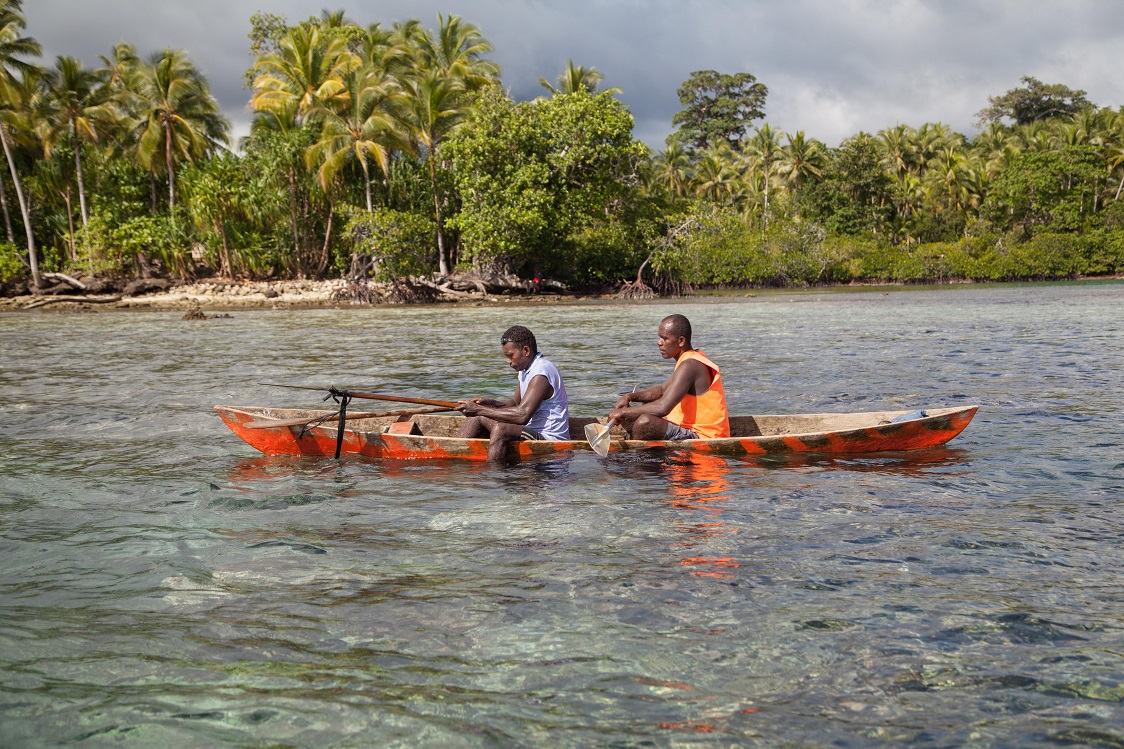 two men in canoe