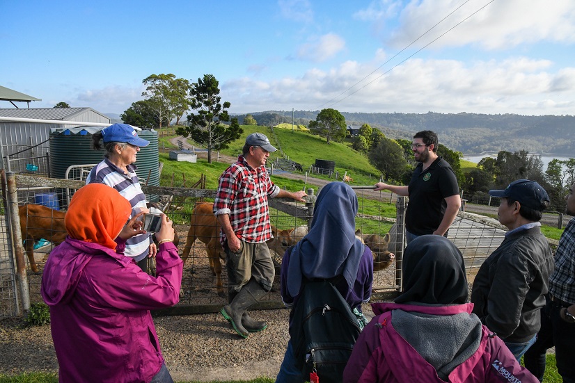 a group of people on a farm 