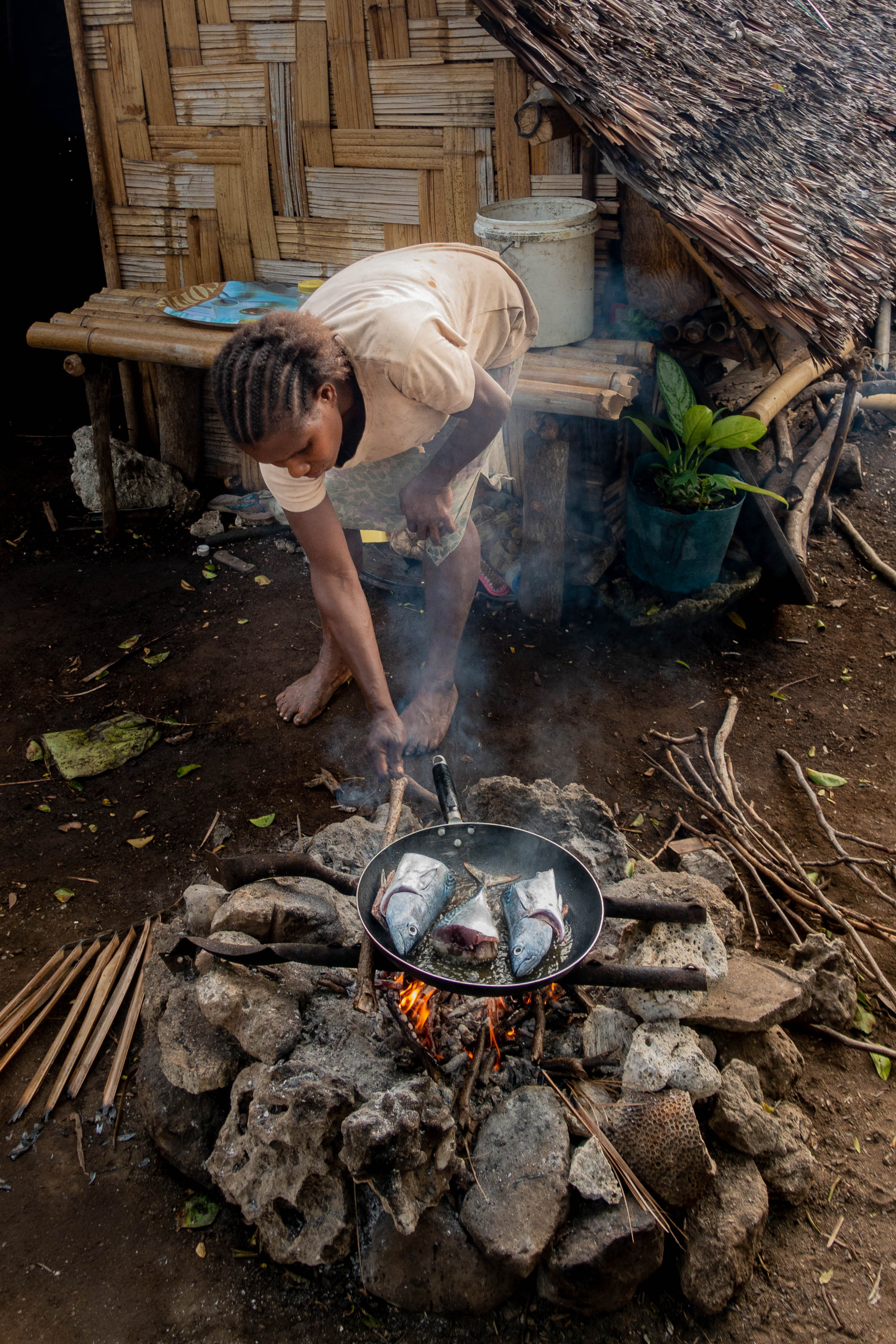 Leah Apon cooking fish 