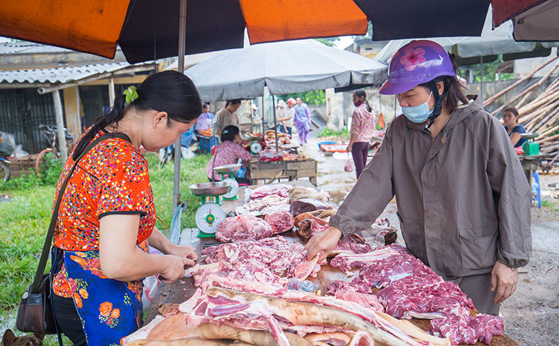 Raw meat on a table at a market in Vietnam