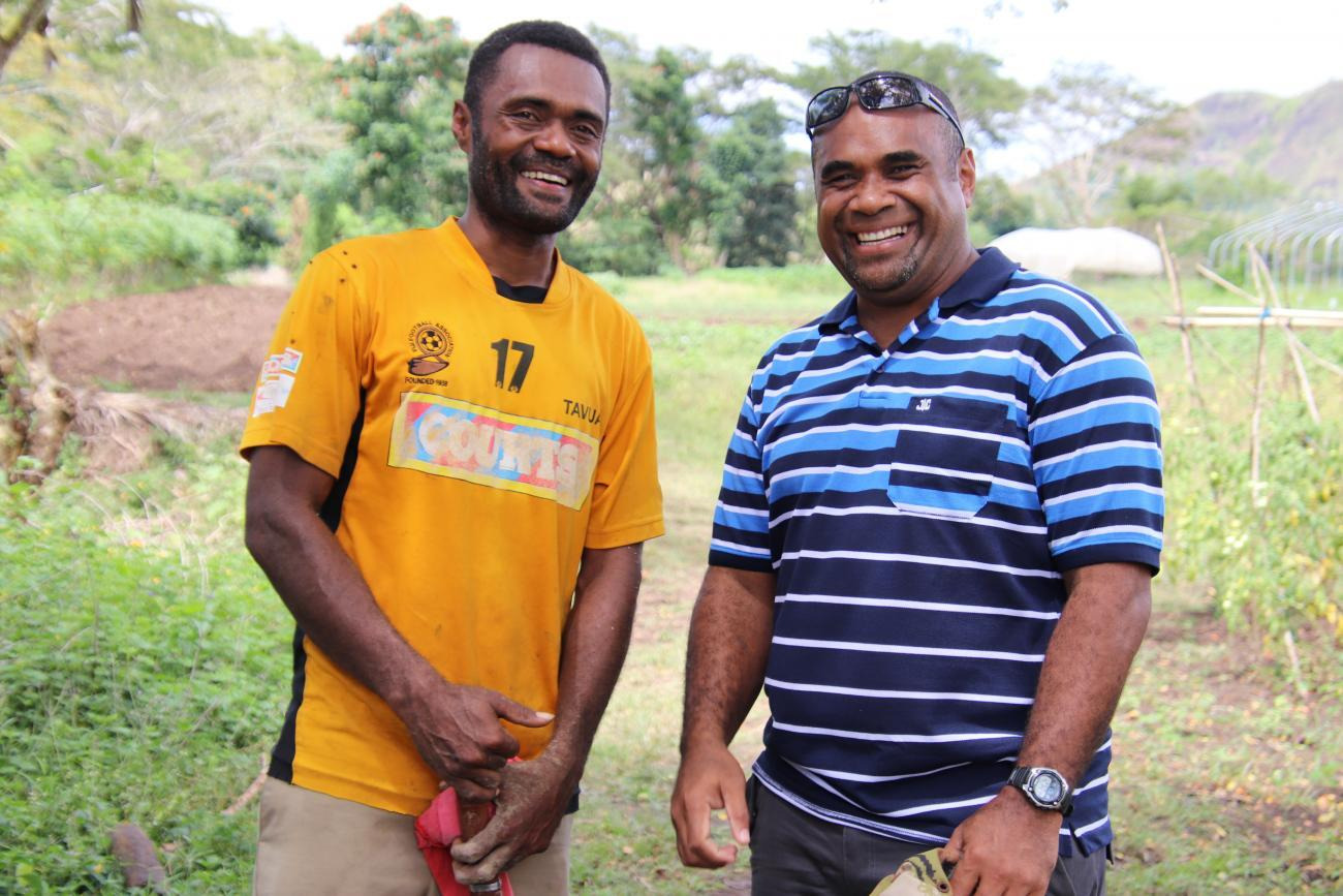 Local Fijian farmer, Emosi Ravato (left) is reaping the benefits of integrating protected cropping systems in his farming practice. 