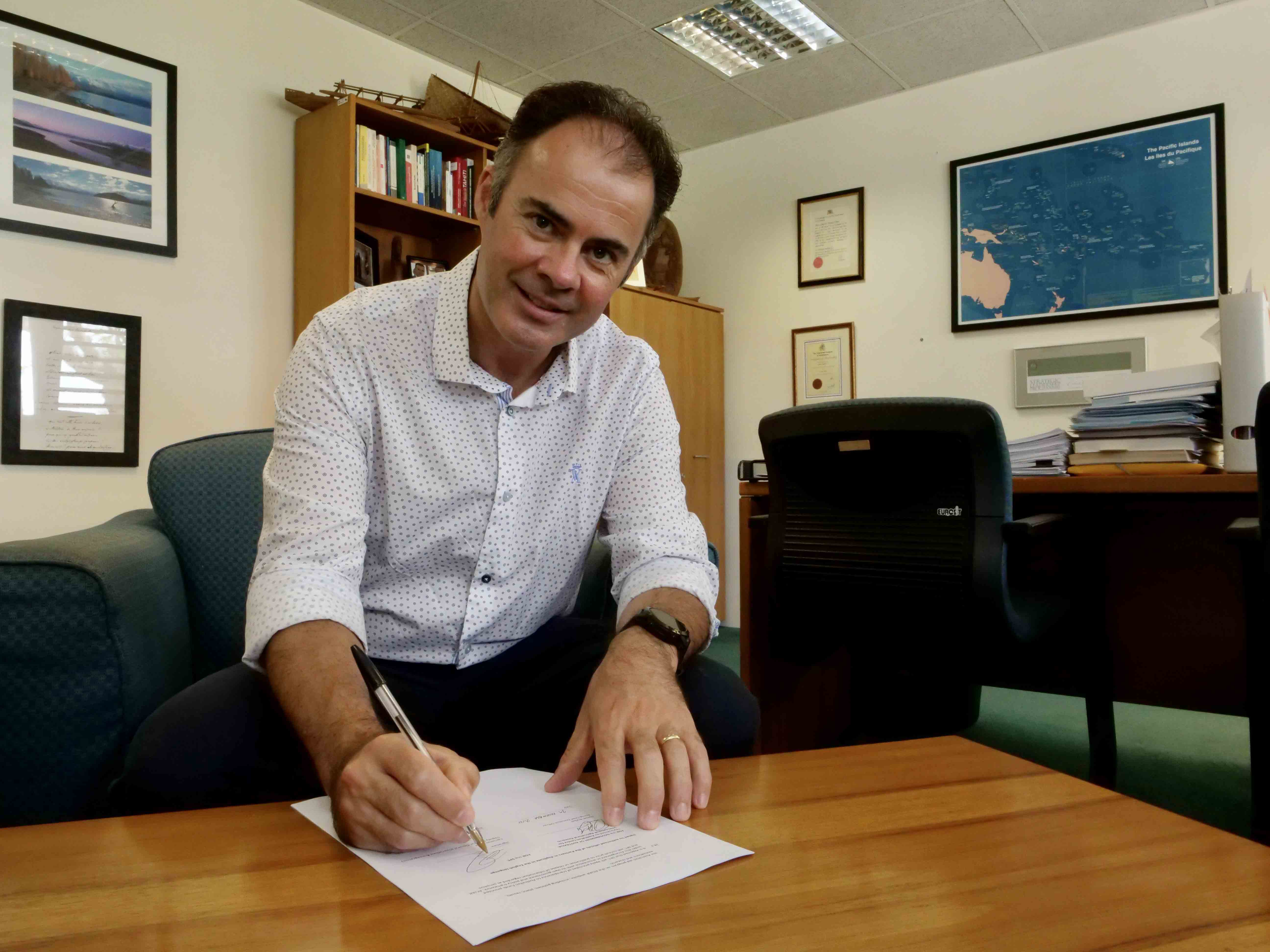 Cameron Diver, SPC Deputy Director-General, signing the new agreement at SPC Headquarters in Nouméa, New Caledonia. 