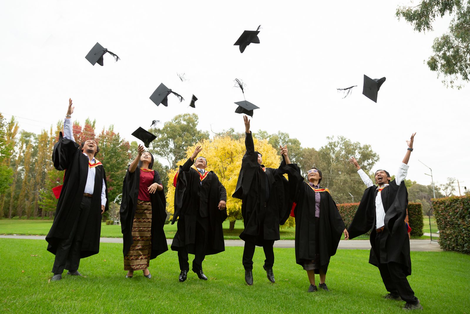 graduates celebrating
