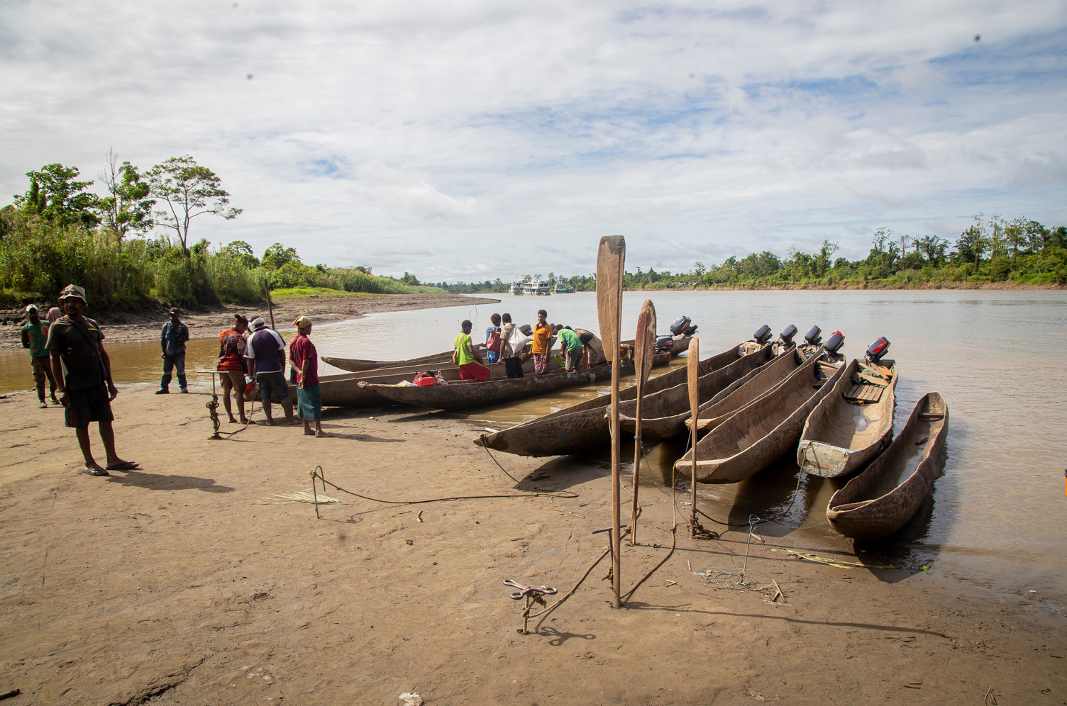 Limited road access means many communities living along the Fly River in Western Province have to travel by both dug out canoes and fiberglass dingies.