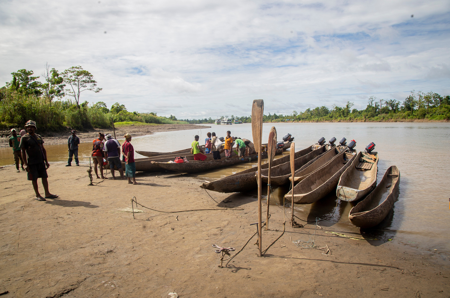 Limited road access means many communities living along the Fly River in Western Province have to travel by both dug out canoes and fiberglass dingies.