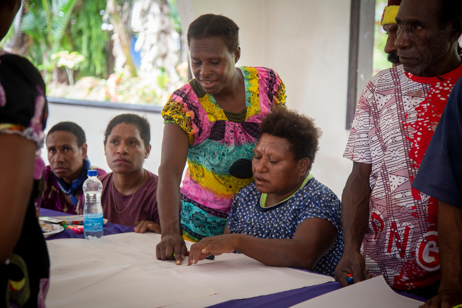  Nela Ben (left) says fisheries products are mostly traded at the PNG-Indonesian border for other goods, which are then resold at higher prices back in their communities.