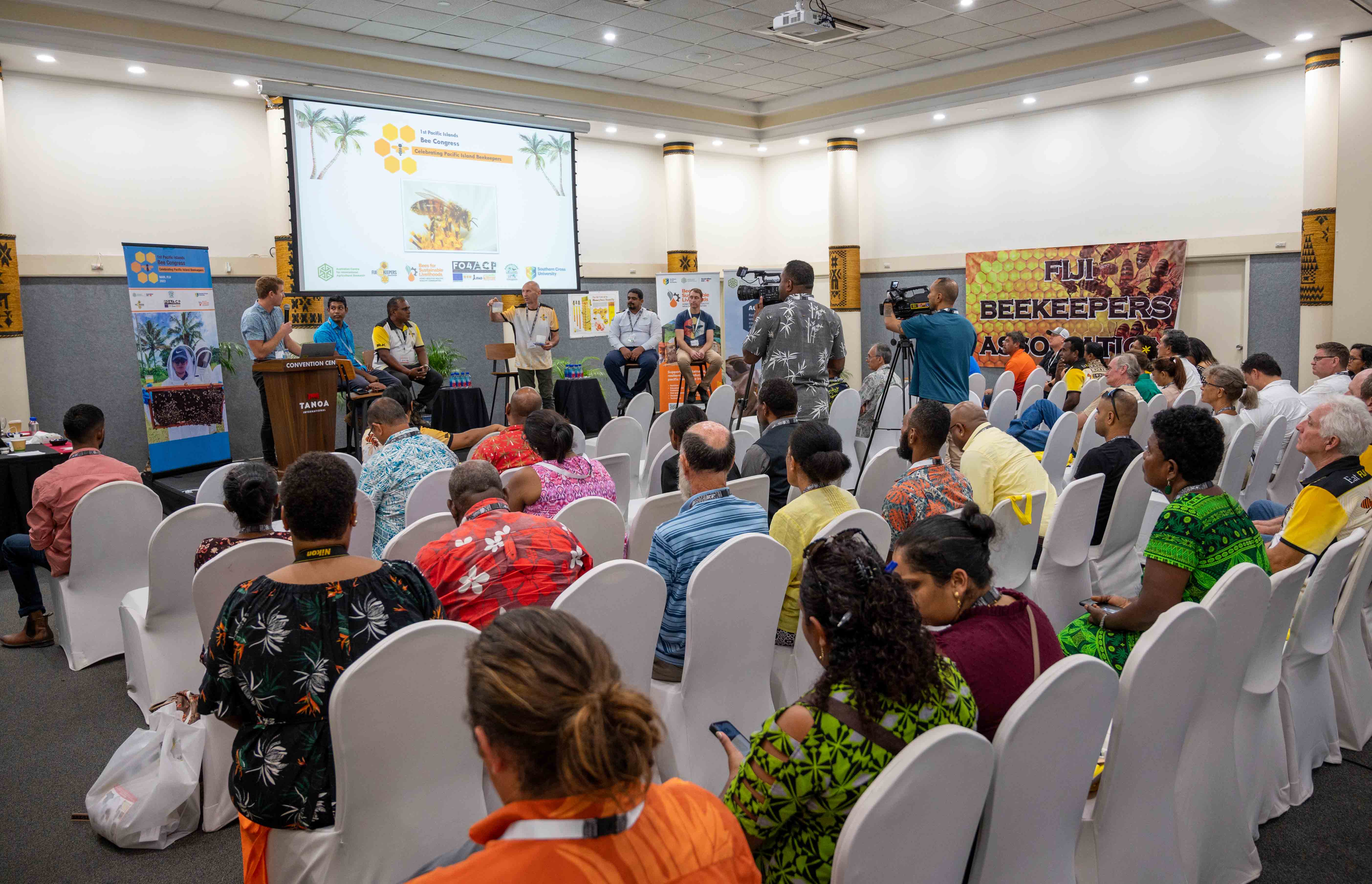 Participants watch a presentation at the Pacific Islands Beekeeping Congress 2023