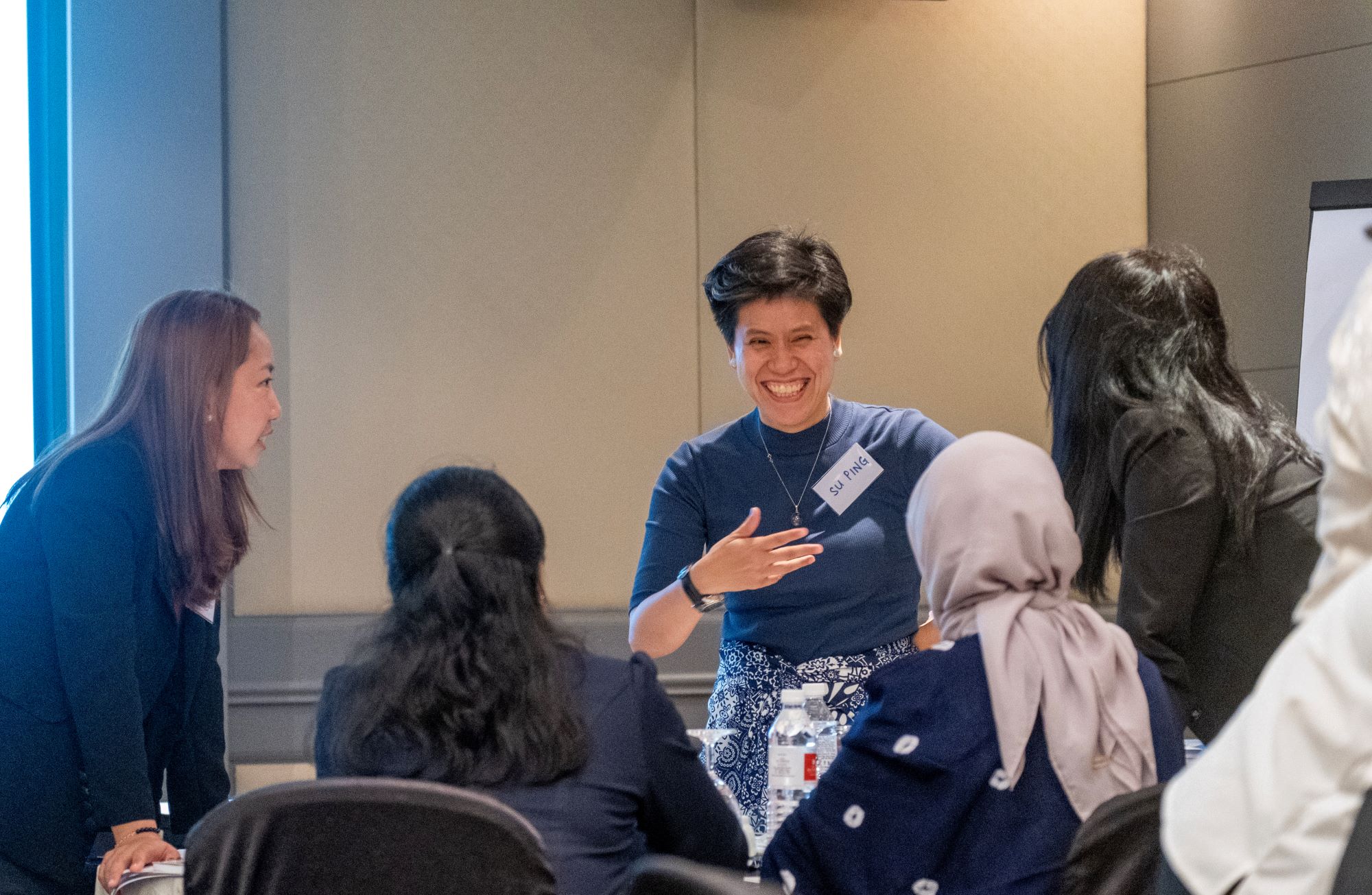 Five women in conversation