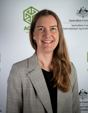 Headshot image of Zita Ritchie against an ACIAR banner background.