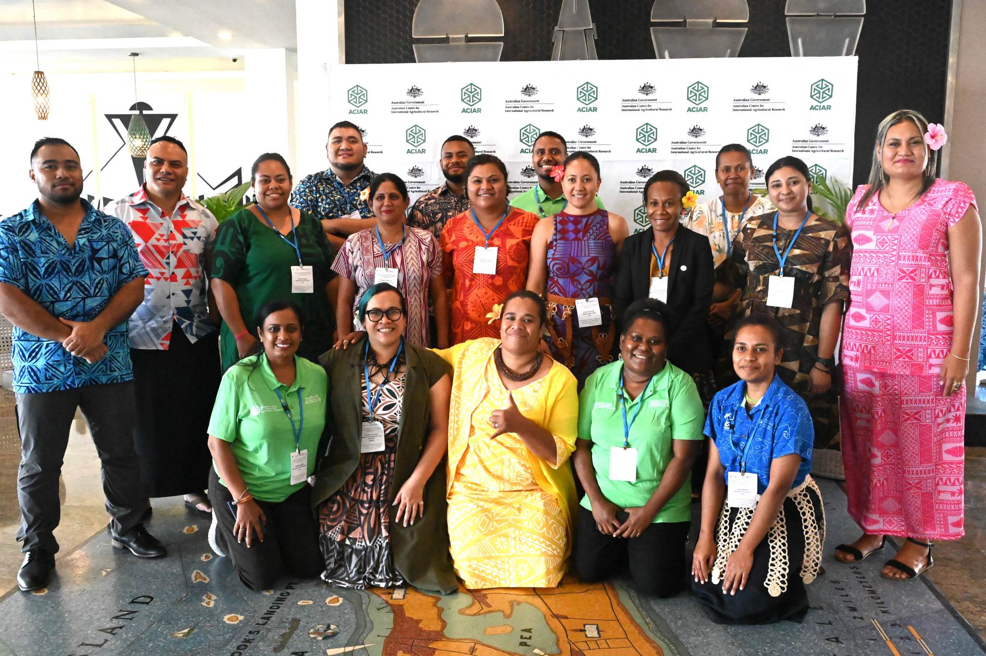 Group of Pacific scholars and researchers posing for a photo