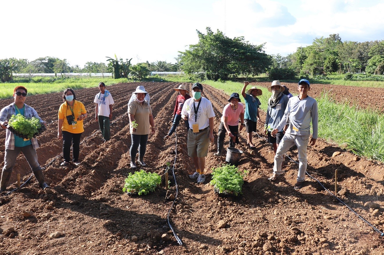 field staff preparing to plant vegetable crops at VSU as part of the COVID-19 mitigation project.  