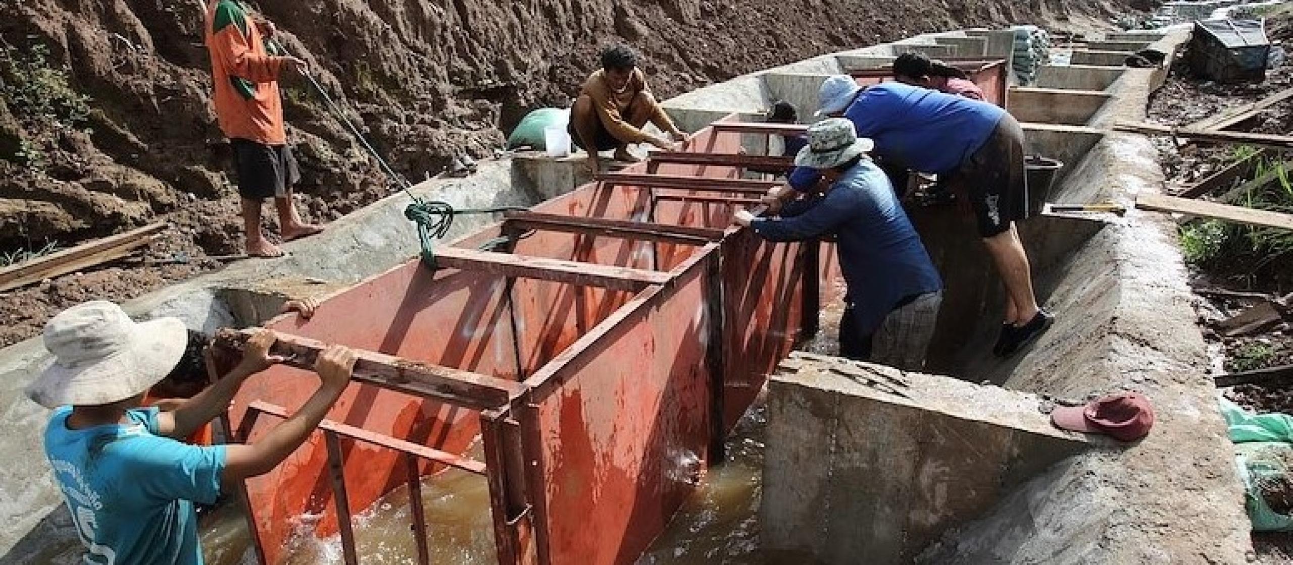 Locals work on a fishery