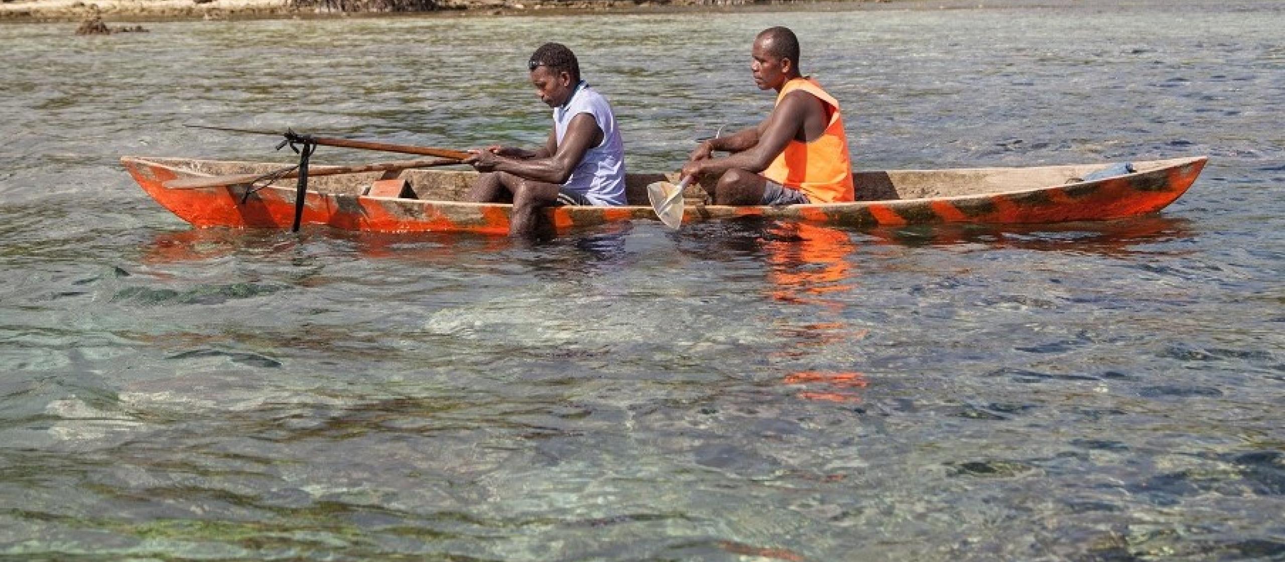 two men in canoe