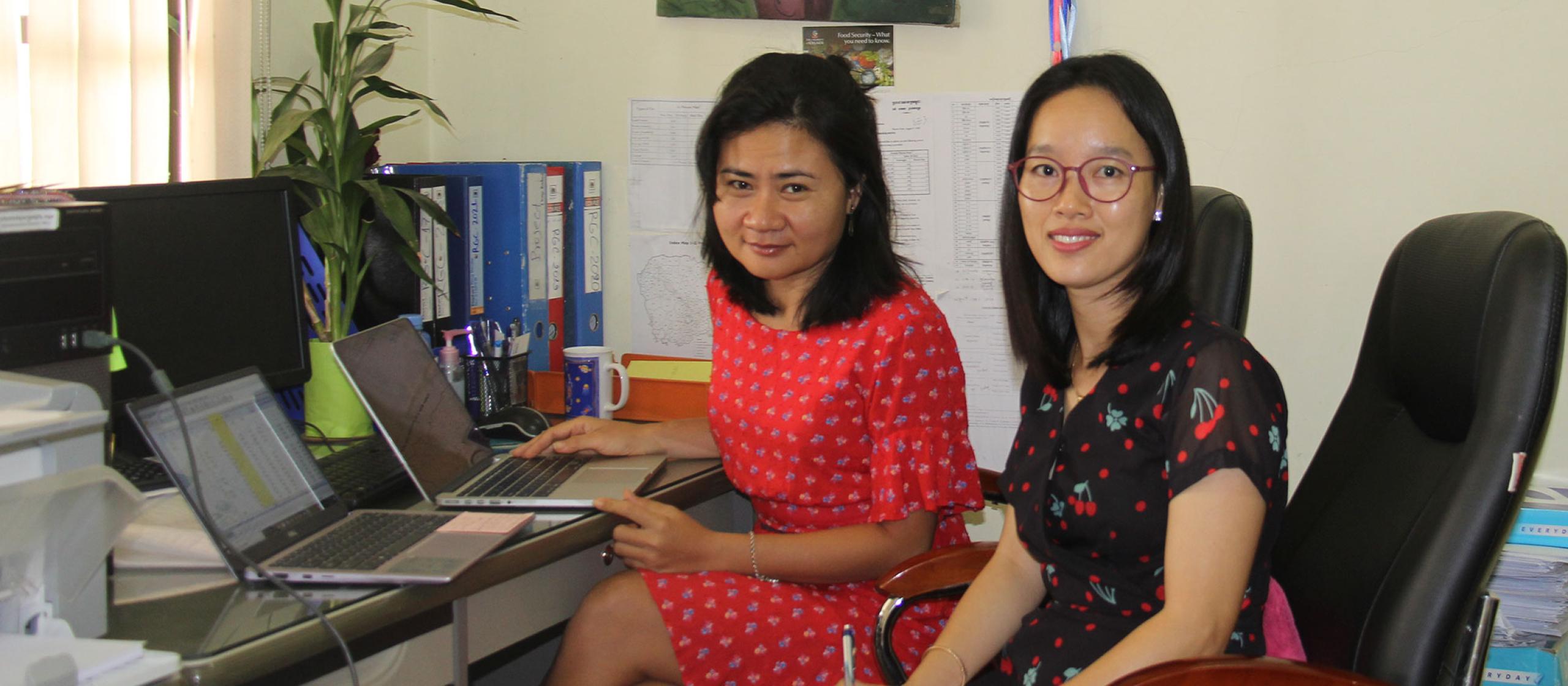 Awardee Sonthida Sambath and her colleague Lim Sophornthida, Cambodia, working together on the small project proposal