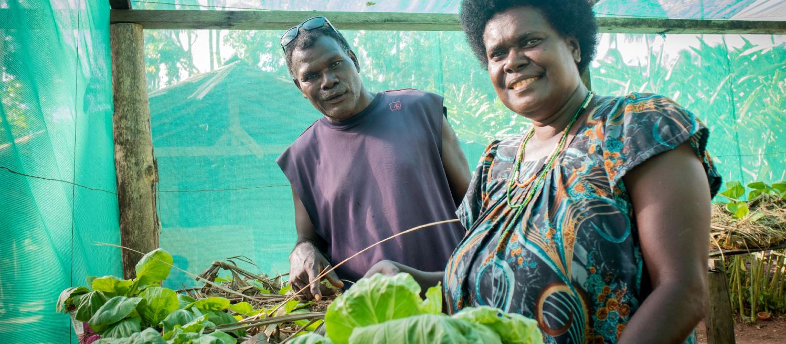 Bougainville farmers Martin and Celestine Masen, showing off their fresh produce. The husband and wife team have undergone the Family Farm Teams training as part of the Bougainville cocoa value chain project. The training is both improving livelihoods for farming families and addressing gender inequalities. It is also flexible enough to be applied across diverse crops, commodities and communities.