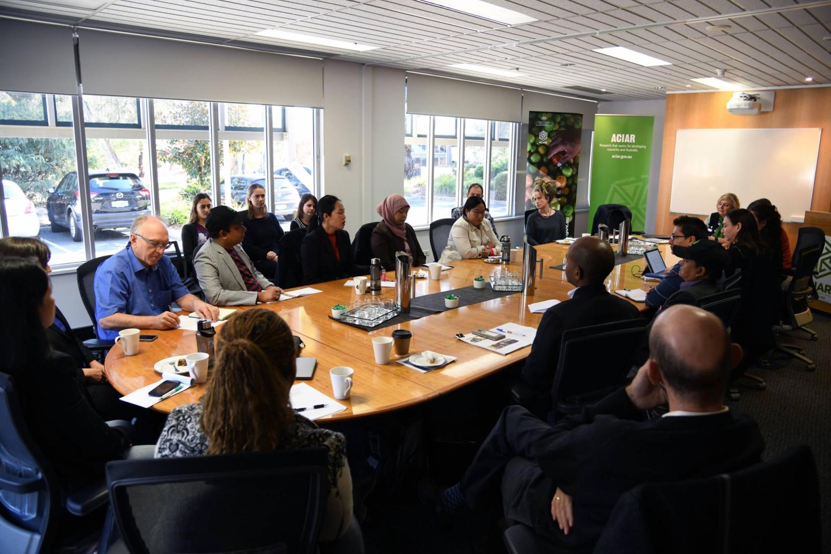 The John Dillon Fellows meeting at ACIAR House in Canberra as part of their four-week visit to Australia.
