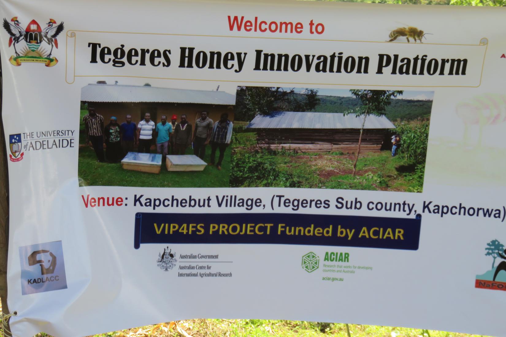 A poster marking the project site in Uganda.