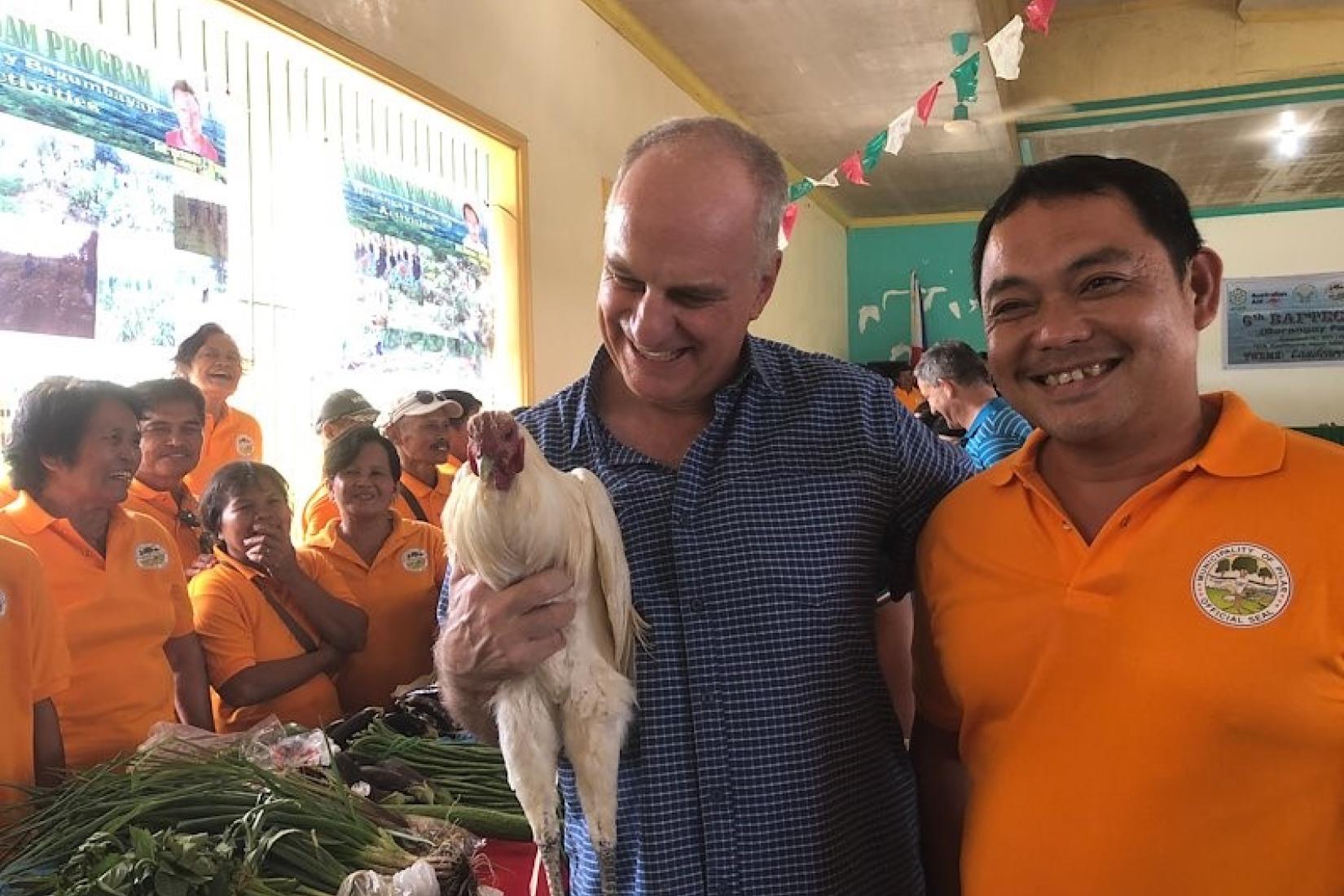 Andrew Campbell (left) with local Mayor Eugenio Datahan II (right).
