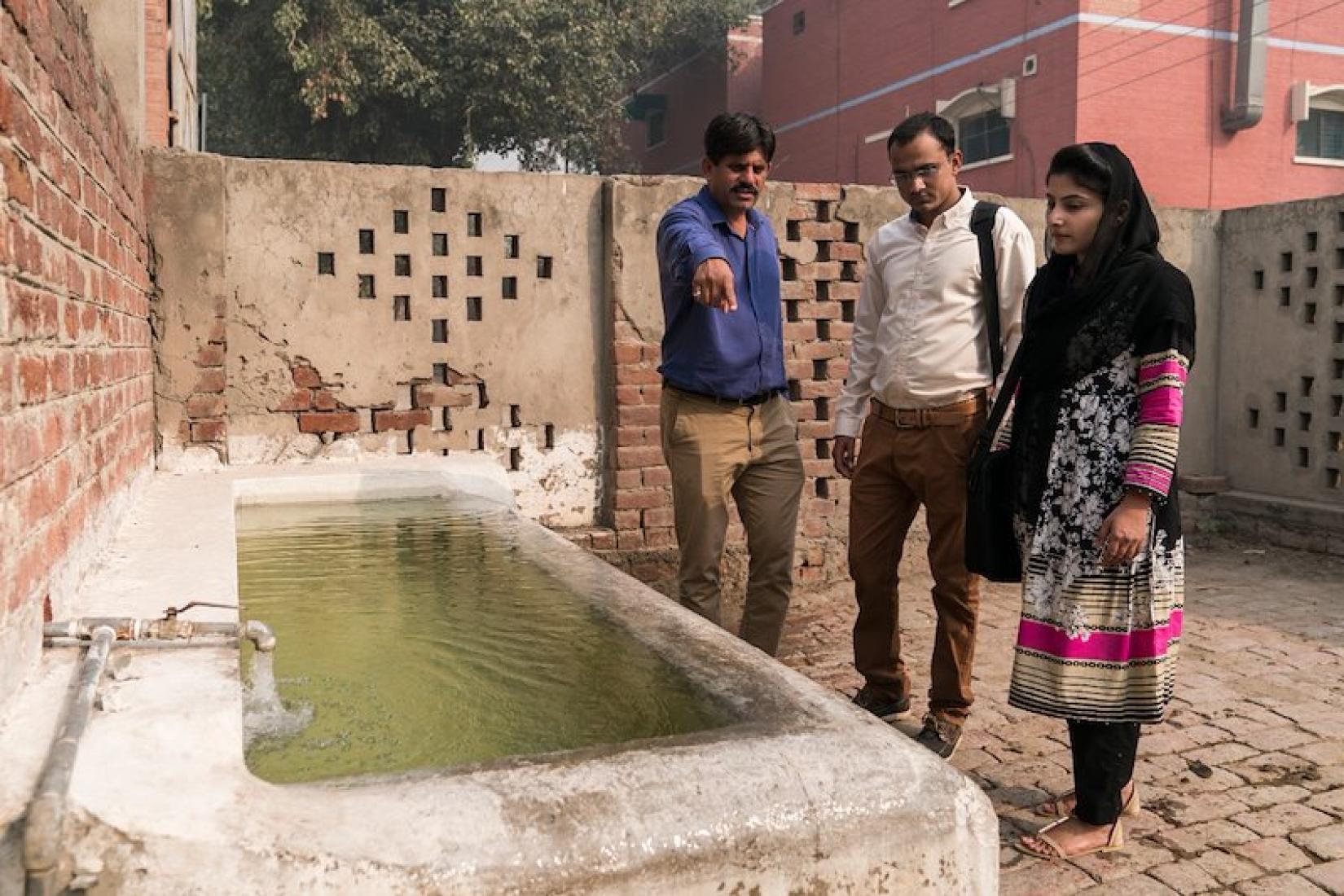 Hassan Warriach (left) sharing his insight on shed design with Punjab Province area advisers Khizer Hayat and Anam Afzal. Image: ACIAR/Conor Ashleigh