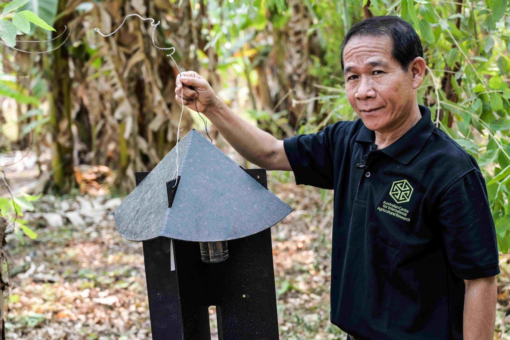 A research team in Laos conducts the same pest-trapping procedure as Cambodia in a forest near Vientiane, the capital city of Lao PDR.
