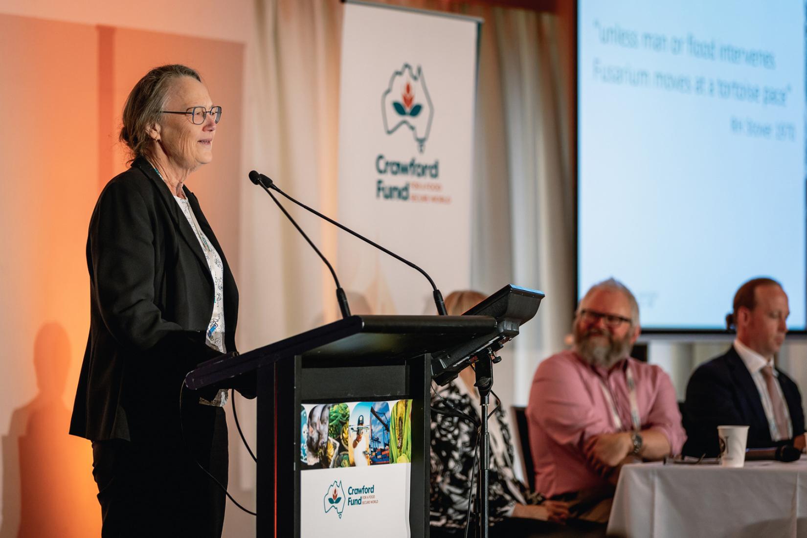 Irene speaking at the 2021 Crawford Conference
