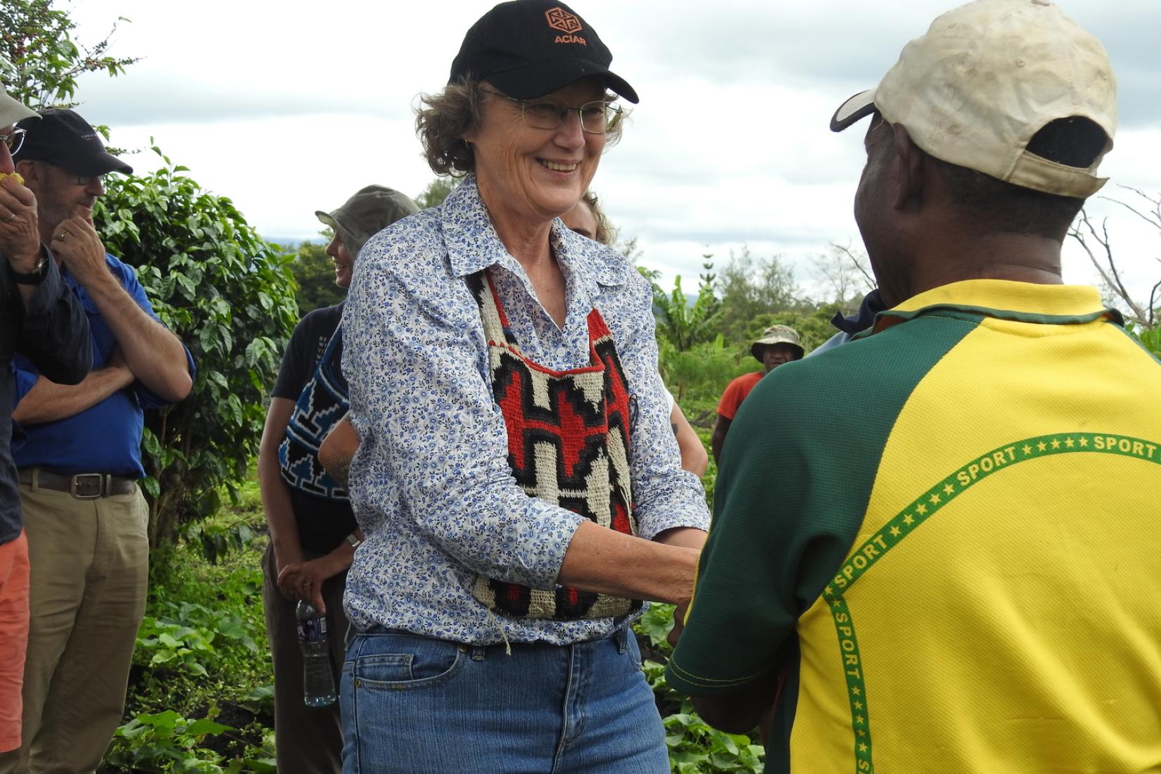 Irene meeting farmers in PNG.
