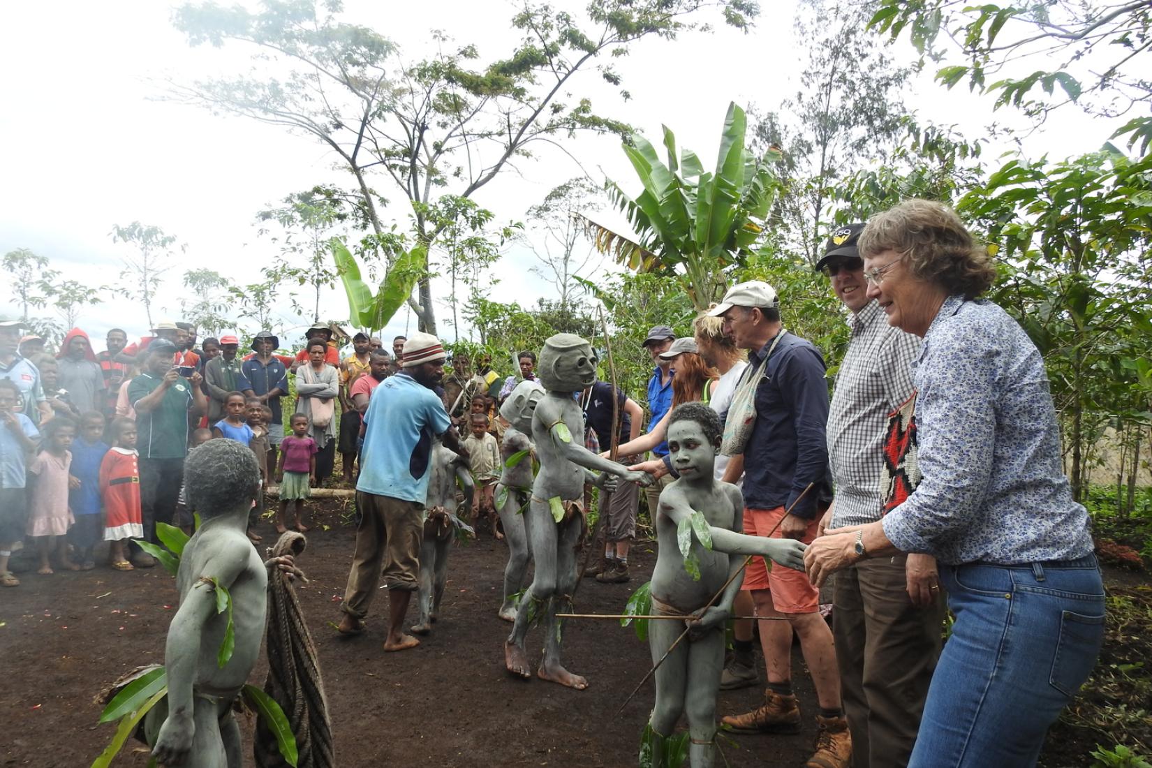 Irene is welcomed by a rural community in the highlands of PNG during a project site visit. 