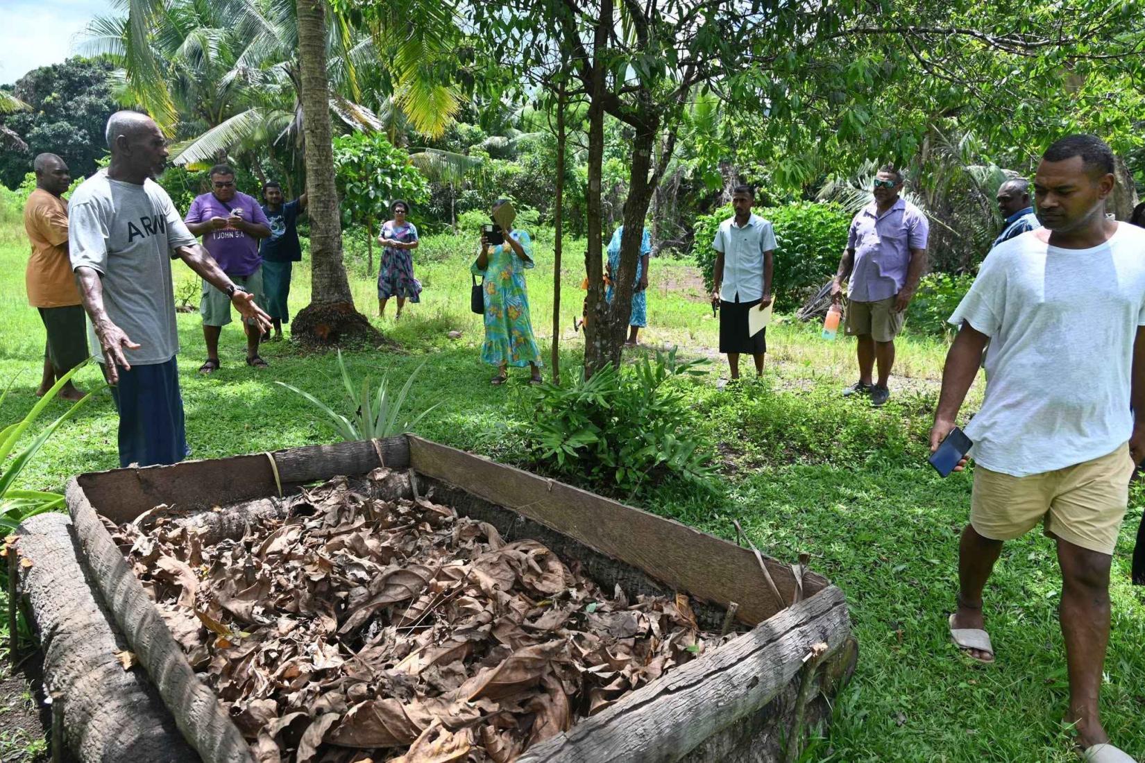 Farmers learning in a community garden.
