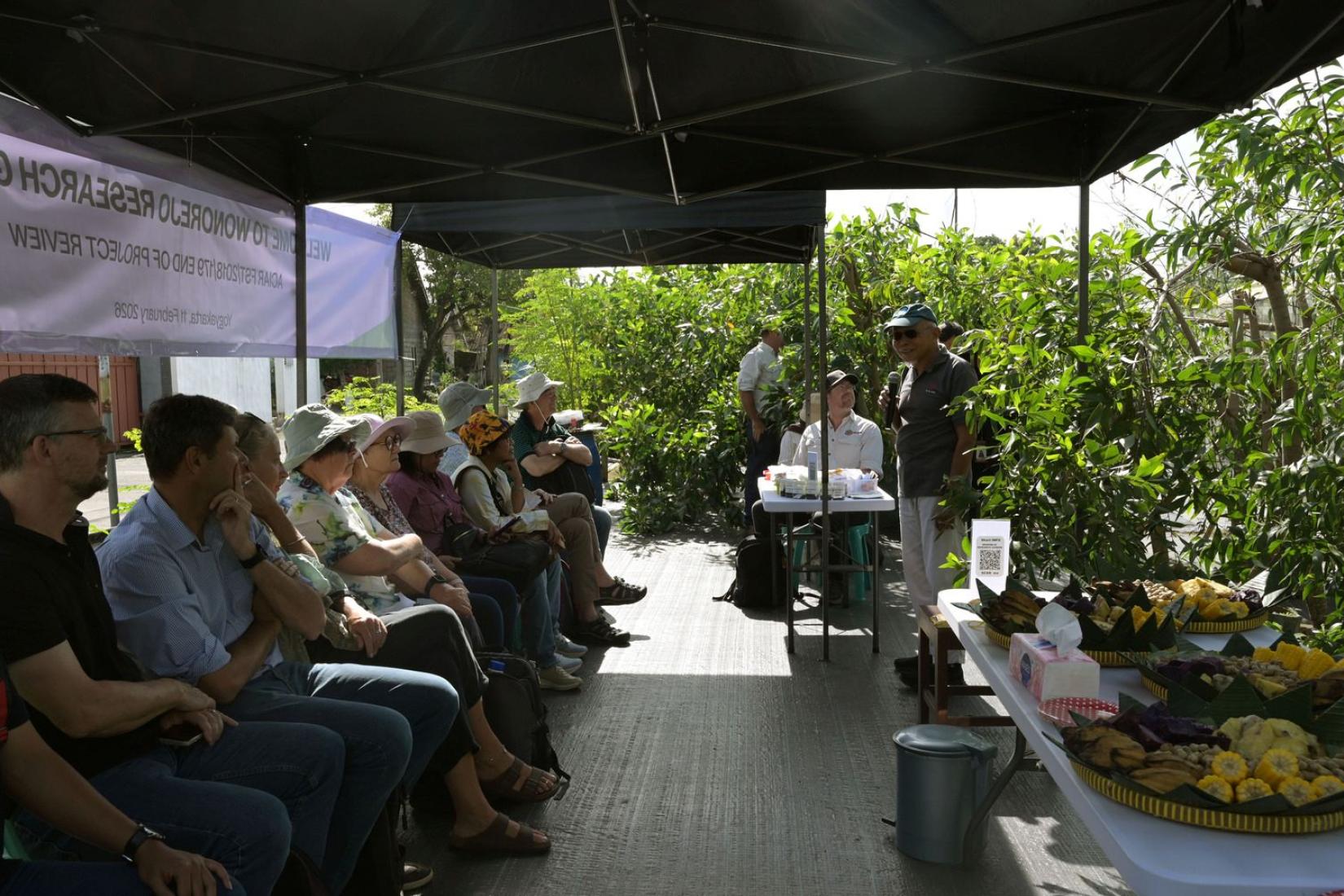 Community members and researchers meeting