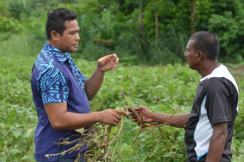 Mani Mua with farmer 