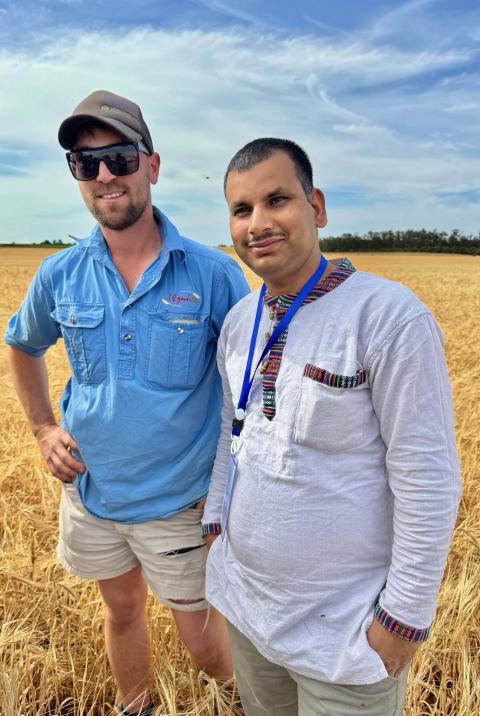 Loxton farmer Brycen Rudiger discusses the challenges of growing wheat in the Mallee region with Nepali participant Gautam  Bhupal 