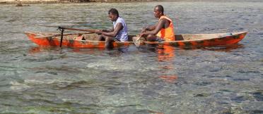 two men in canoe
