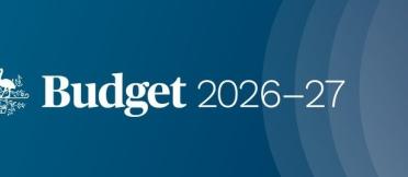 Government crest with the words “Budget 2026–27” on a blue background.