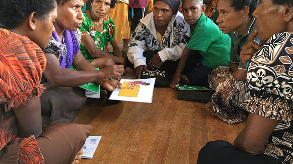 Group of women having a meeting sitting on the floor