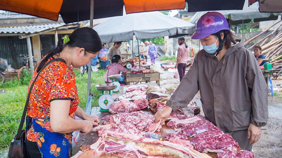 Raw meat on a table at a market in Vietnam