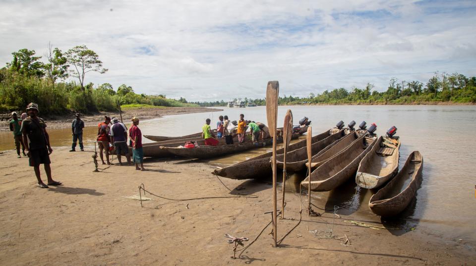 Limited road access means many communities living along the Fly River in Western Province have to travel by both dug out canoes and fiberglass dingies.