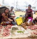 Women from Daru Island, in the South Fly District of Western Province, selling their goods at the Town market. 