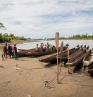 Limited road access means many communities living along the Fly River in Western Province have to travel by both dug out canoes and fiberglass dingies.