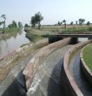 A water channel with a bridge over it