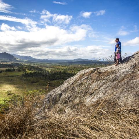woman and young child overlooking a valley