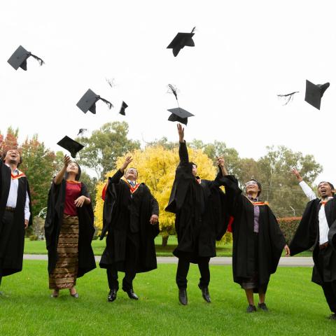 graduates celebrating 