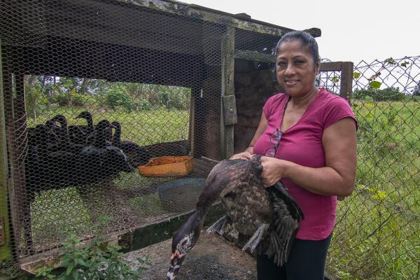 woman holding a duck