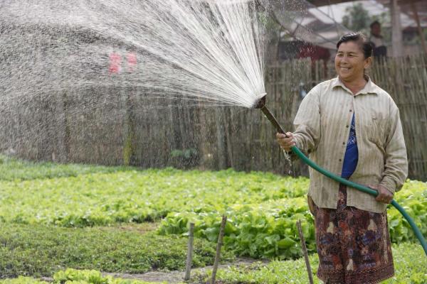 Grandma Oaun earns about AUD 200 a year on growing vegetables. Researchers found that farmers like her are likely to double their income using groundwater irrigation systems.