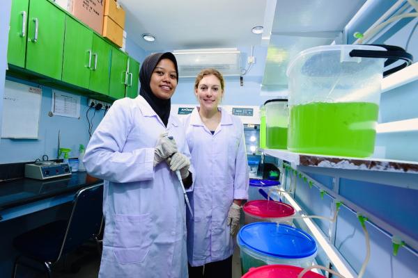 Australian volunteer Siobhan Heatwole (right) moved to Indonesia for a year to work with MARS Symbioscience. Photo: Darren James, Scope Global