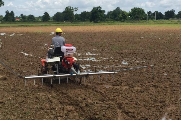 Cambodian farmers are adopting new technologies to help intensify and diversify their rice production systems to increase their returns: Eli Air seeder (modified on a Kubota transplanter tractor) being trialled at Don Bosco School Farm, Battambang for wet seeding and quality seed production. Photographer: Bob Martin