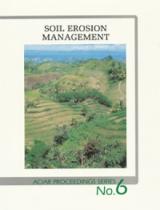 book cover shows a birds eye view of green hills