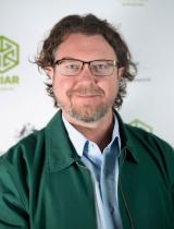 Headshot image of Nicholas Hogarth