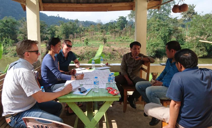 Dr Hilary Smith and project team talking to farmers about the impact of government policy on teak value chains (Nam Bak).
