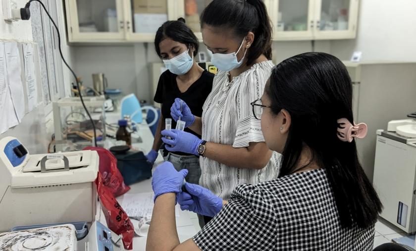 Researchers test water samples as part of the BEN study examining the relationship between foodborne gastrointestinal infections in Timorese infants.  